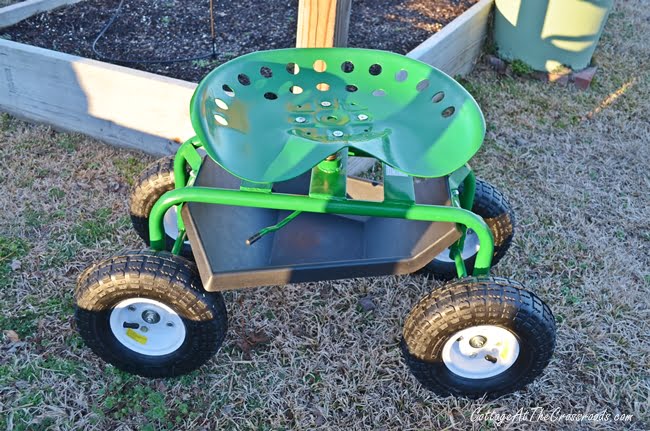 One stop gardens rolling work seat with store tool tray