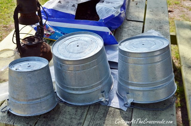 Topsy turvy galvanized buckets