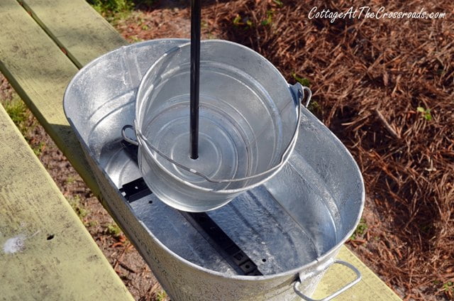 Topsy turvy galvanized buckets