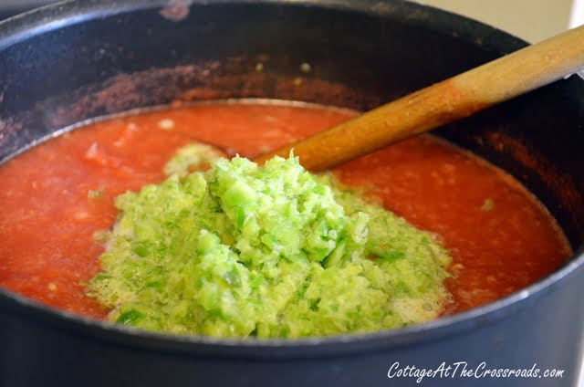 Green peppers from food processor added to tomato sauce.