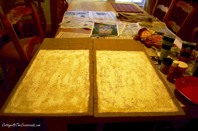 Painted scarecrows on burlap