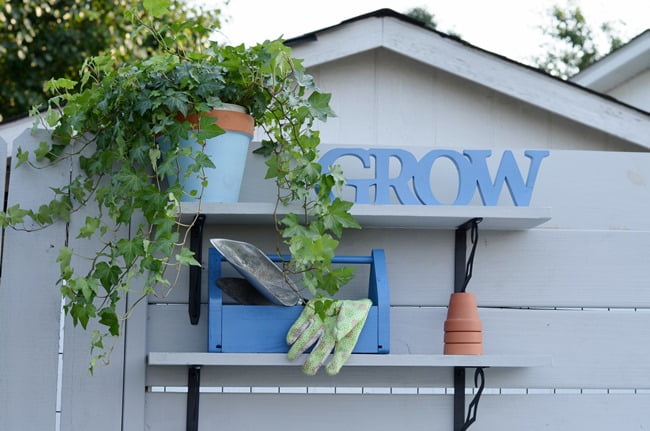 Shelves on potting bench | cottage at the crossroads