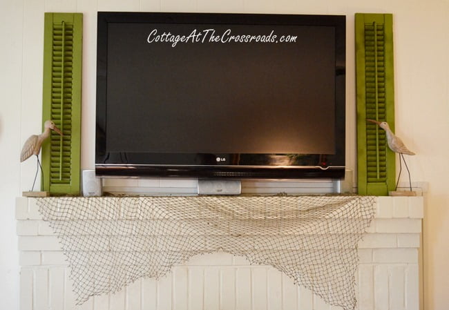 Using shutters to decorate around a flat screen tv | cottage at the crossroads