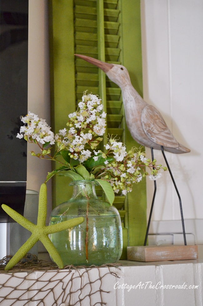 Using shutters to decorate around a flat screen tv | cottage at the crossroads