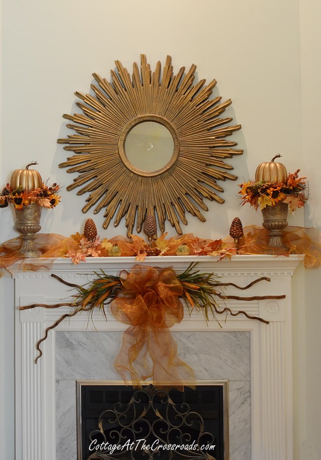 Painted urns on the fall mantel | cottage at the crossroads