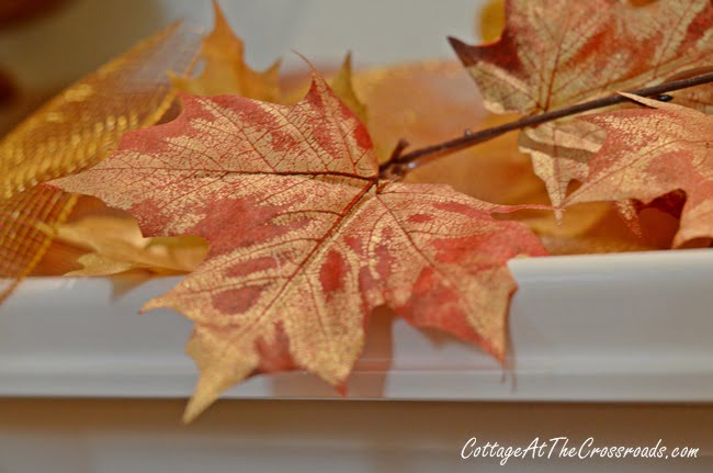 Painted urns on the fall mantel | cottage at the crossroads