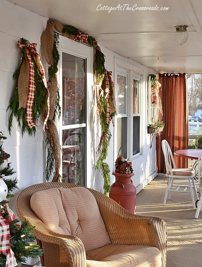 Festive Grapevine Garland Over a Farmhouse Front Door With Glass - Soul &  Lane