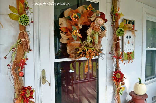 Festive Grapevine Garland Over a Farmhouse Front Door With Glass - Soul &  Lane