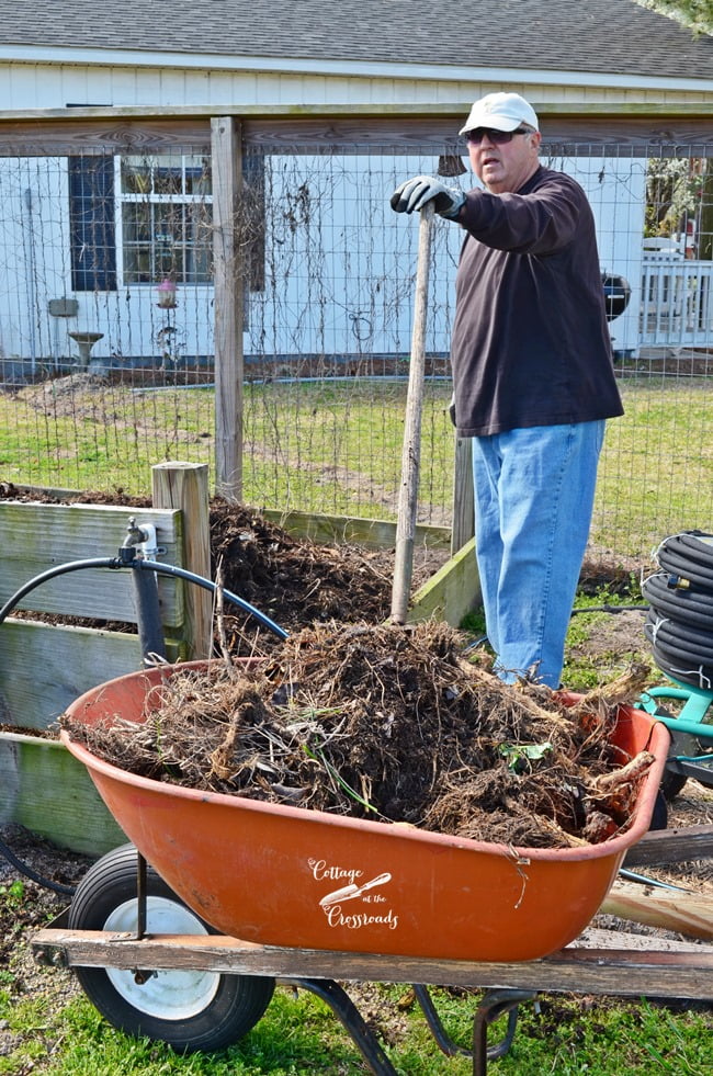 Shoveling compost | cottage at the crossroads