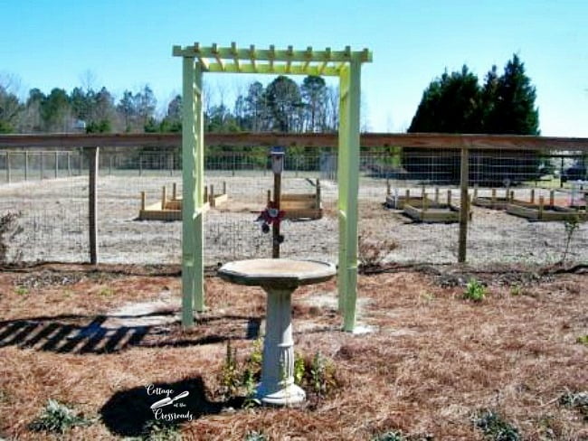 Arbor in the flower garden | cottage at the crossroads