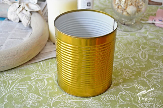 Aluminum can used in making an oyster shell candle ring | cottage at the crossroads