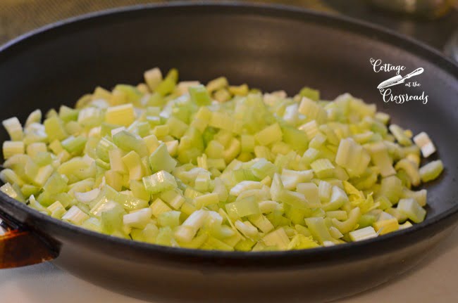 Using fresh tomatoes from the garden to make homemade creole sauce