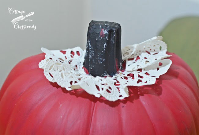 Paper doily around the stem of a polka dot pumpkin | cottage at the crossroads