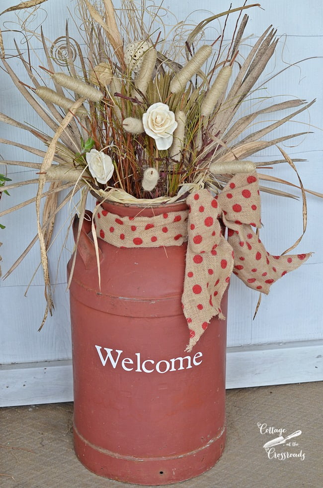 Old milk can decorated for fall | cottage at the crossroads