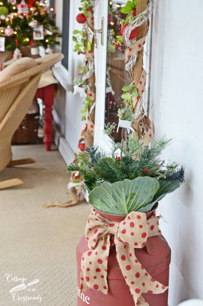 A cottage christmas porch with a gardening theme