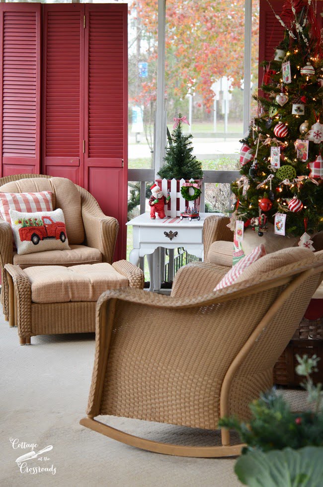 A cottage christmas porch with a gardening theme