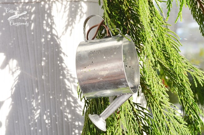 Watering can lighted garland