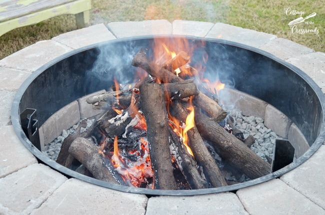 First fire in our new belgard fire pit | cottage at the crossroads