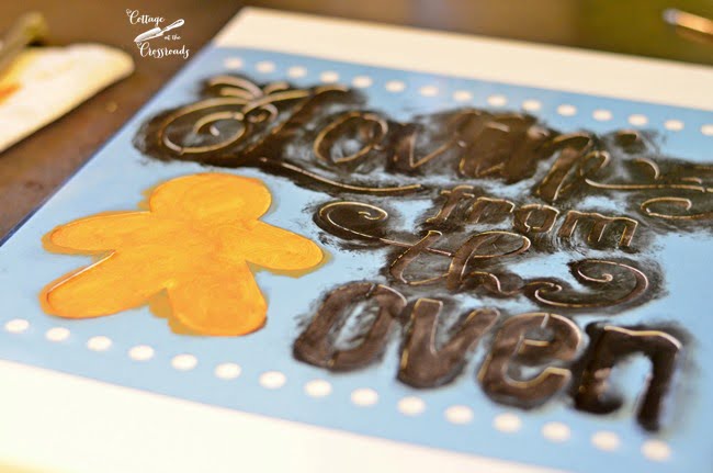 Stenciled gingerbread sign