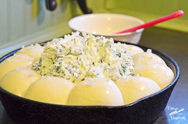 Warm turnip dip added to the center of bread ring