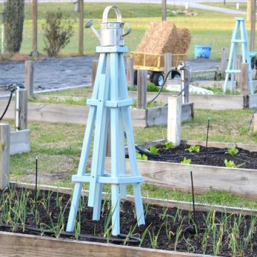 Wooden pyramid shaped trellises for the garden | cottage at the crossroads