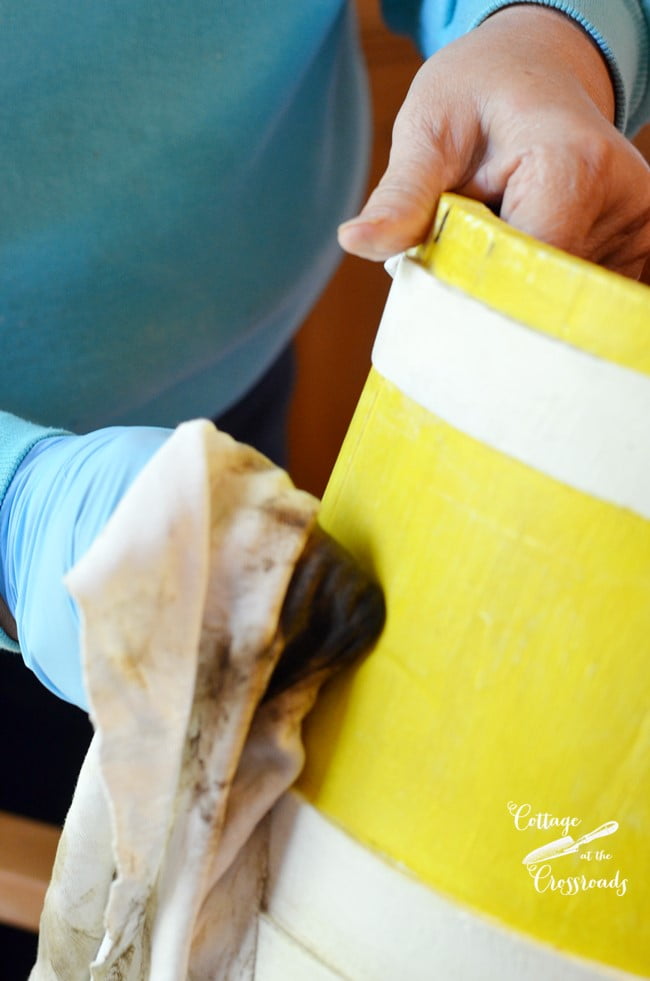 Applying dark wax to a painted sugar bucket | cottage at the crossroads