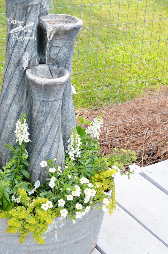 Galvanized tub fountain and planter