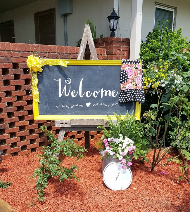 Diy welcome chalkboard sign made from an old, dated piece of artwork