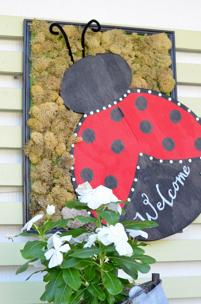 Wooden ladybug sign | cottage at the crossroads