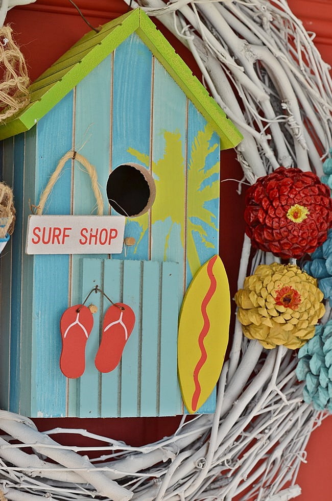 Surf shop birdhouse on a summer wreath