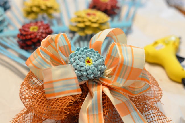 Orange and aqua ribbon used on a rake wreath