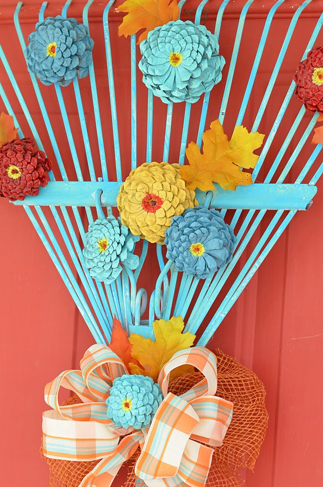 Fall rake wreath with pine cone zinnias