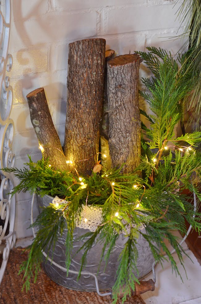 Metal buckets with logs and lights | cottage at the crossroads