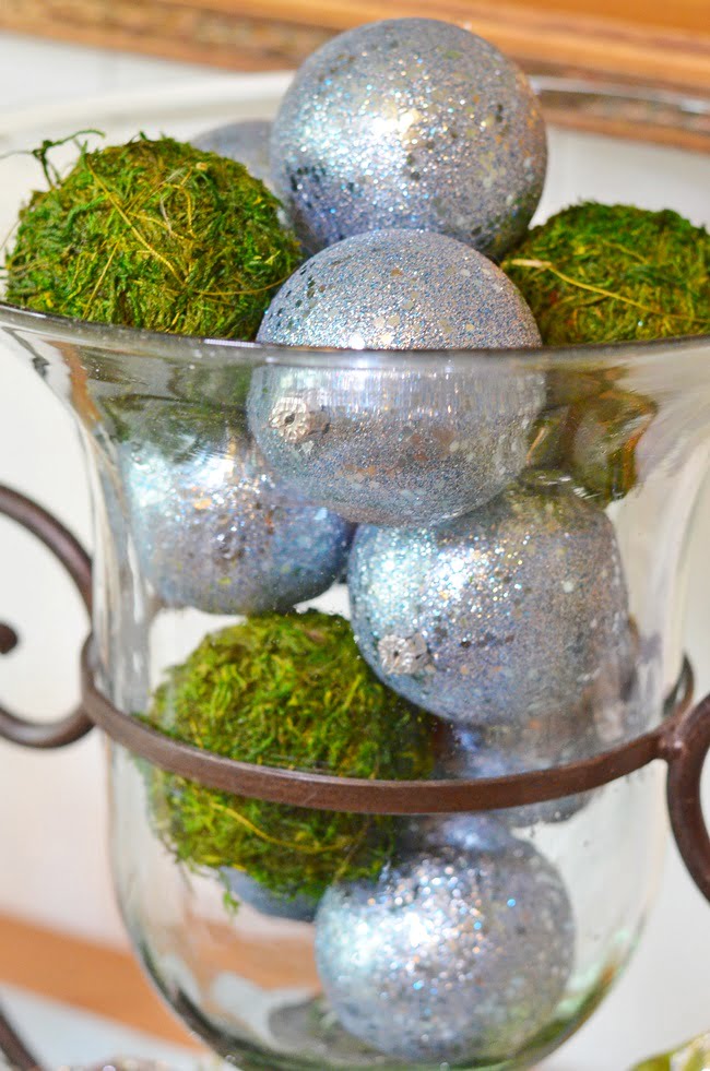 Green moss balls mixed with blue ornaments