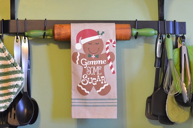 Gingerbread kitchen towel hanging on a rolling pin | cottage at the crossroads