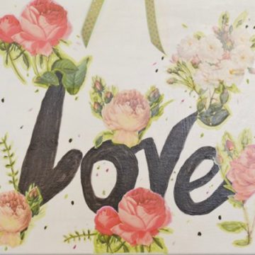 Love with decoupaged roses on canvas