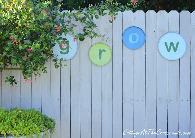 Diy garden grow letters made from burner covers