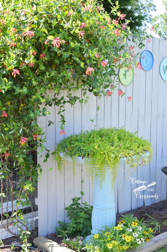 Diy garden grow letters made from burner covers