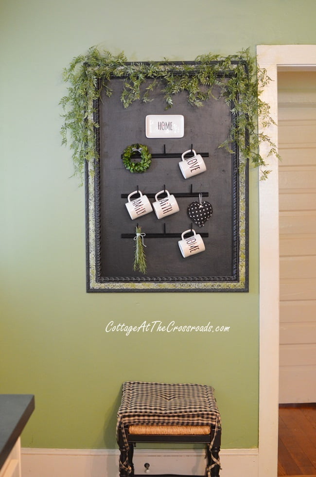 Diy farmhouse style mug rack made from a wooden thread rack | cottage at the crossroads