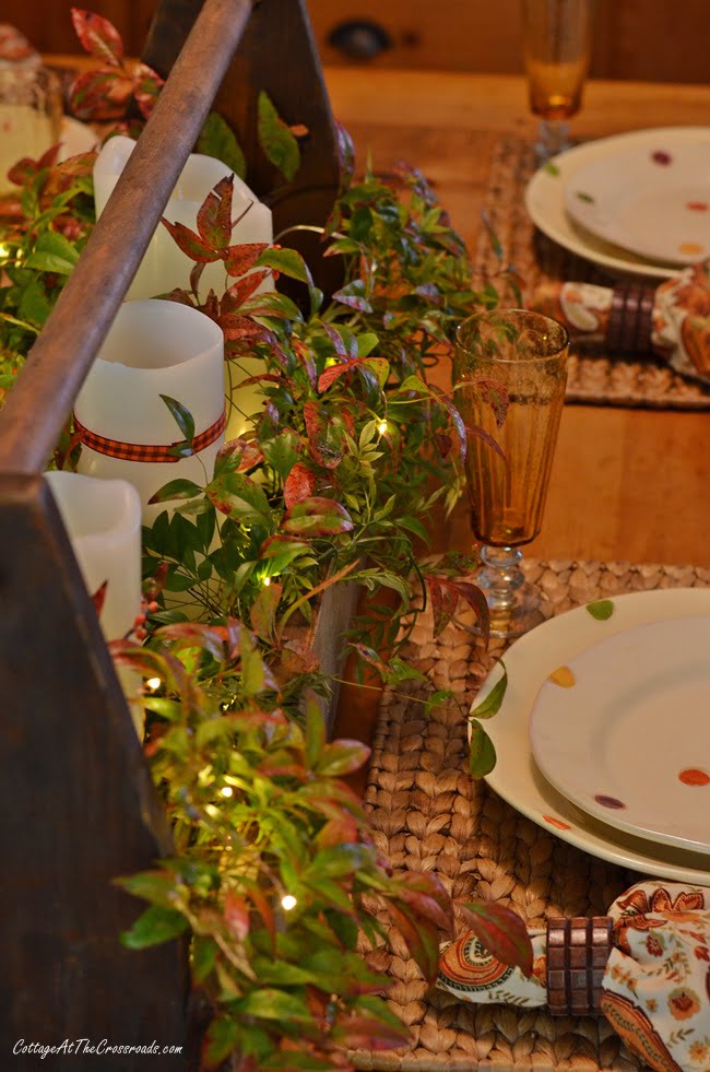 A traditional fall farmhouse tablescape celebrating the beautiful colors of the harvest season