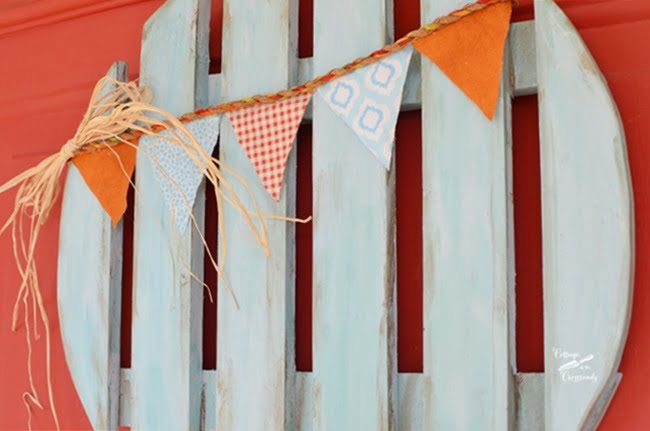 Bunting on a repurposed plant dolly fall wreath