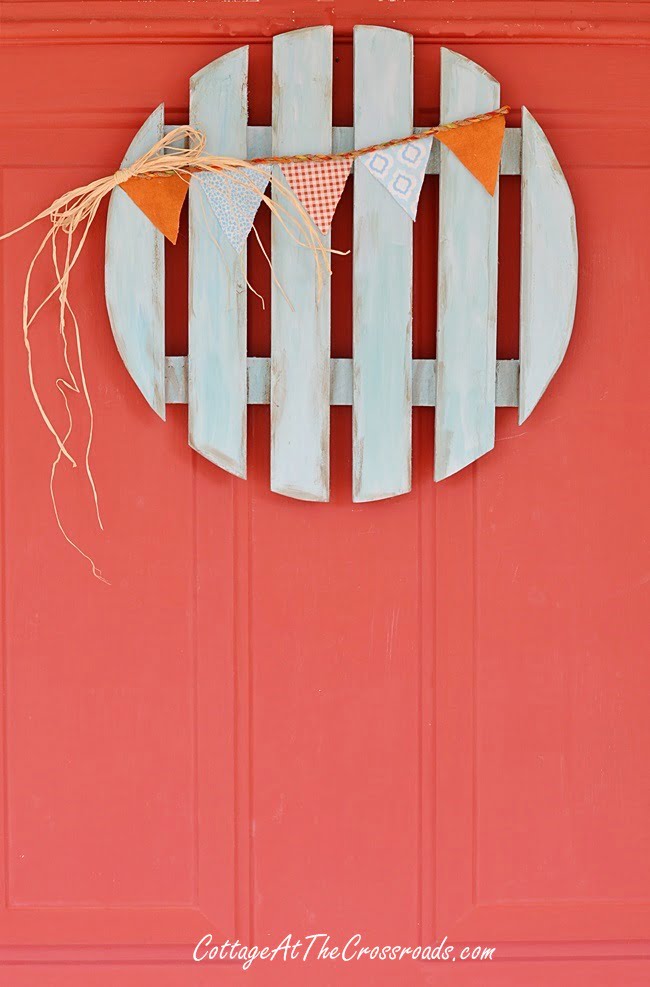 Repurposed plant dolly becomes a fall wreath