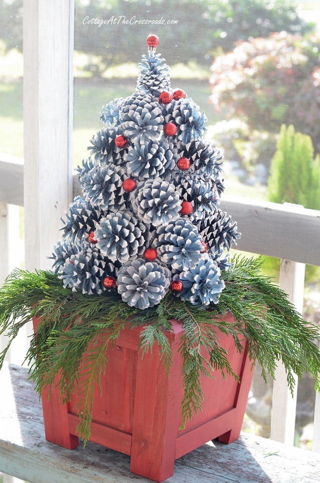 Here are the directions on how to make a pine cone christmas tree