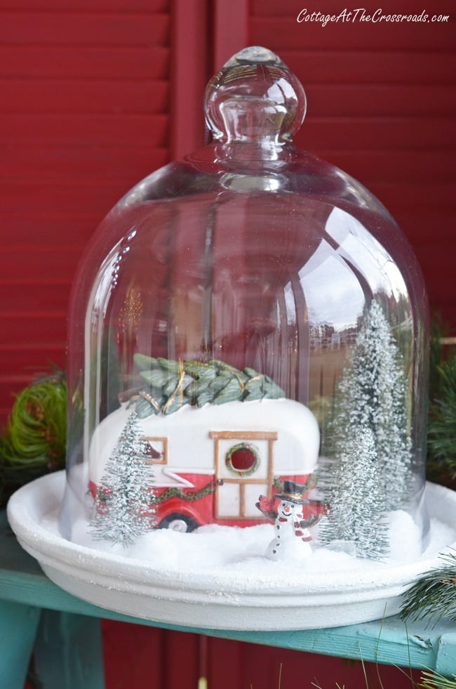 Vintage christmas camper under a cloche