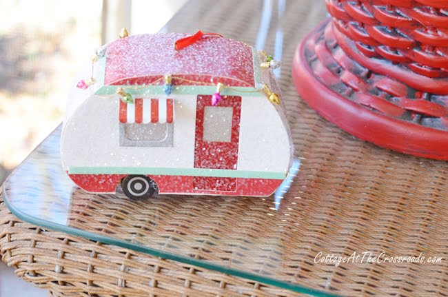 Vintage camper on a christmas porch