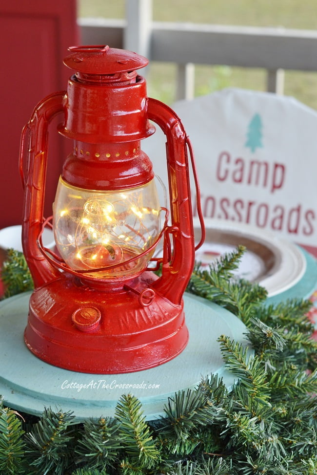 Vintage lantern with fairy lights inside