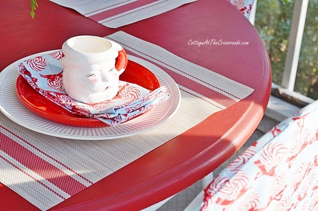 Chair covers used on a christmas porch