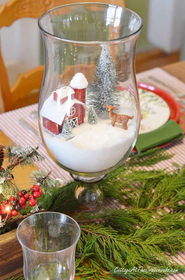 Red barn winter scenes in candle holders