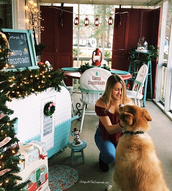 Rose and lucy on the vintage camper christmas porch