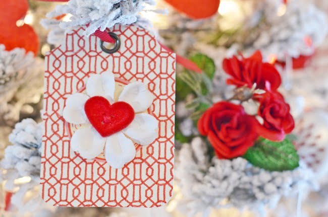 Paper tag with a heart shaped button